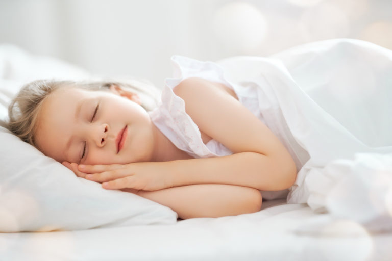 child-is-sleeping-in-the-bed